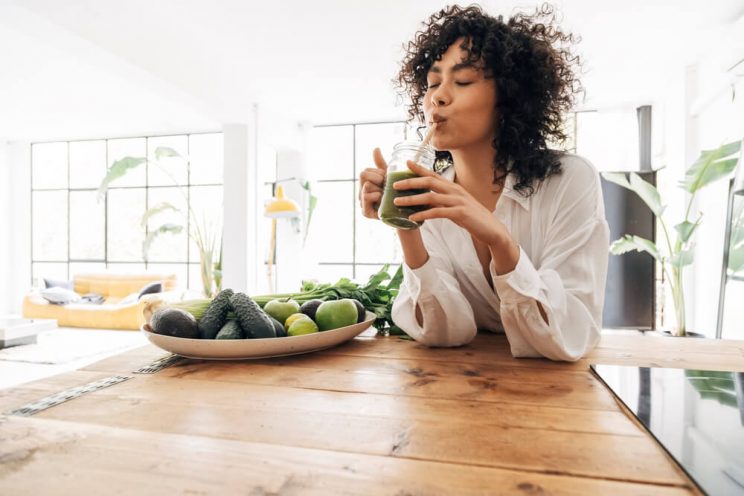 Woman drinking smoothie