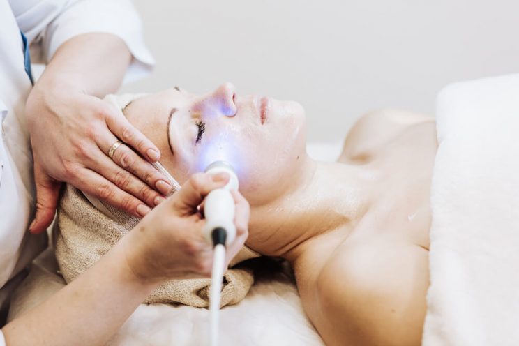 Woman having laser treatment