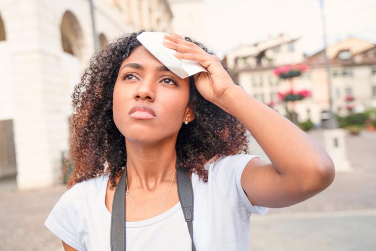 Woman sweating