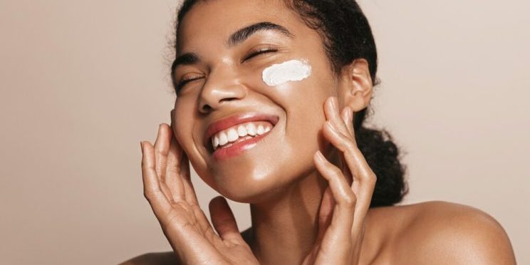 smiling woman moisturizer