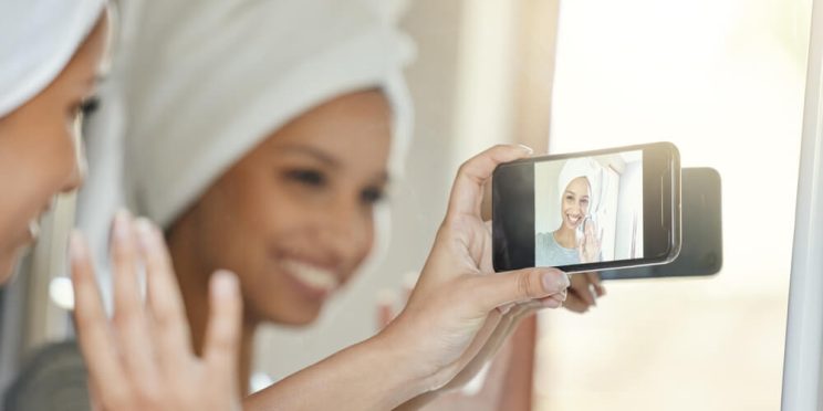 woman holding phone